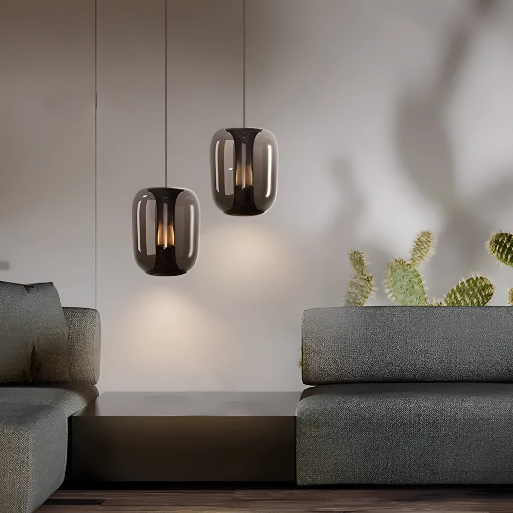Minimalist Nordic single-light pendant chandelier with glass shade in smoke grey, cognac, or clear colour.