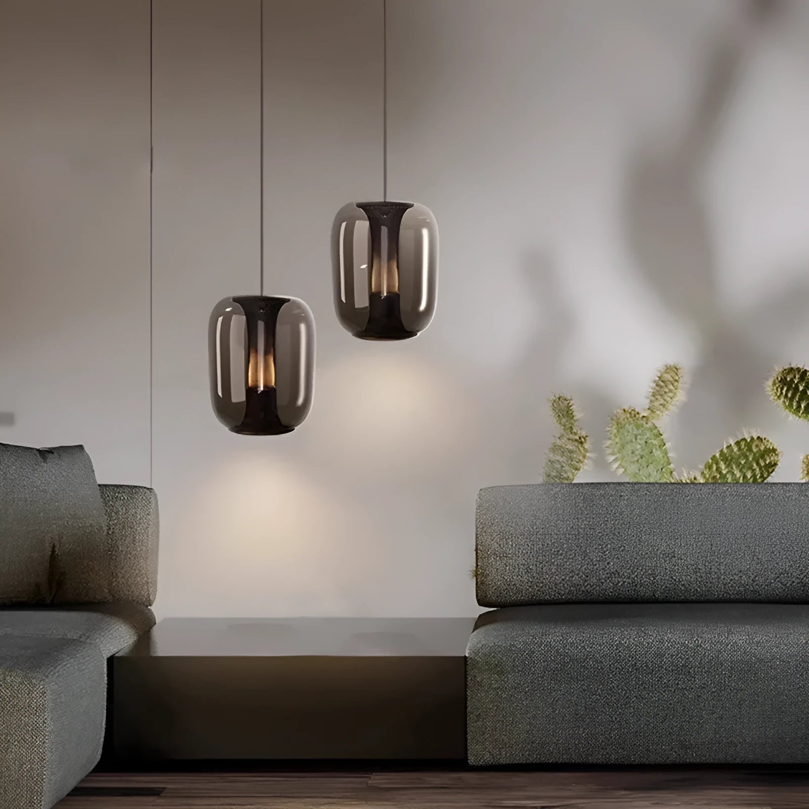 Minimalist Nordic single-light pendant chandelier with glass shade in smoke grey, cognac, or clear colour.