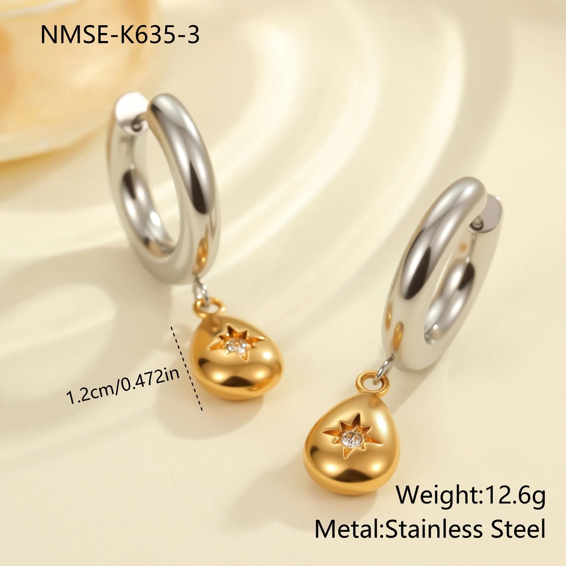 Christmas tree shaped stainless steel earrings with 18K gold electroplated finish and heart star geometric accents