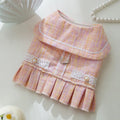 Purple and pink lightweight polyester clothing for a small dog or cat on a hanger.