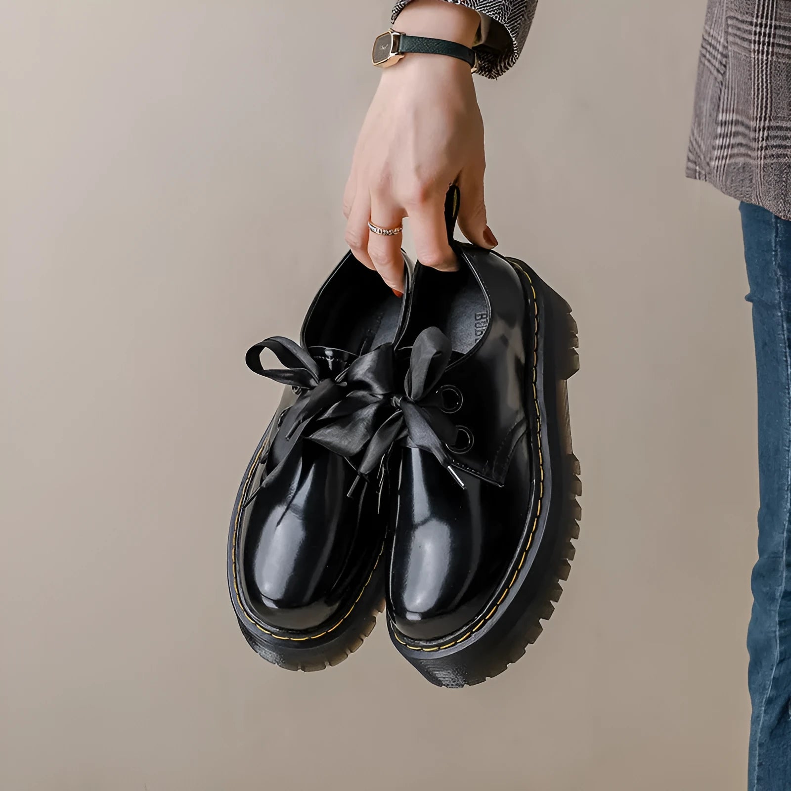 Women's thick soled leather shoes with cross straps and ribbons in black or white colours