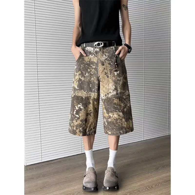 Yellow snake pattern camouflage cropped jeans with cotton denim construction showing tooling detailing