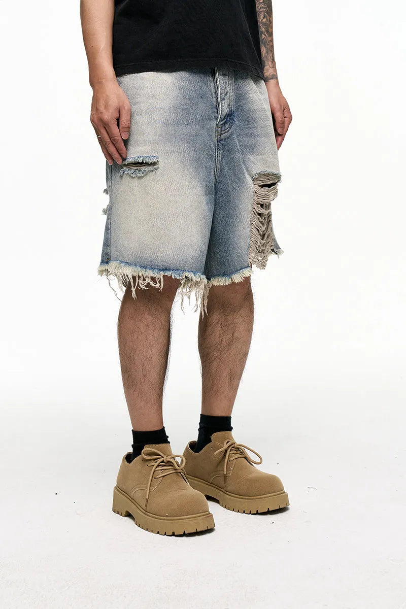 Men's light blue retro washed baggy denim shorts with wide leg and zipper fly