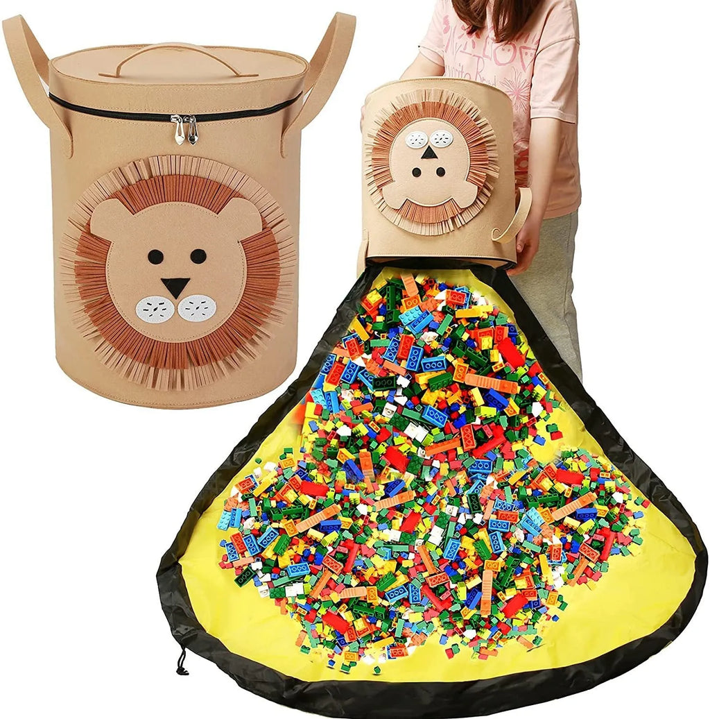 Green felt cube storage bag with pull rope open as a floor play mat for toys.