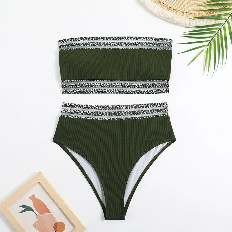 Black strapless leopard print bikini set with separate bra and shorts on a neutral background.