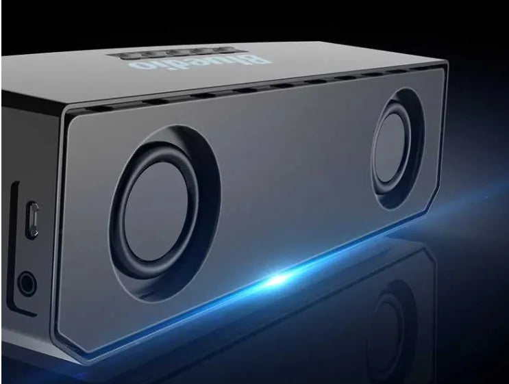 Black cloud smart speaker with 52mm driver showing micro-USB charging port