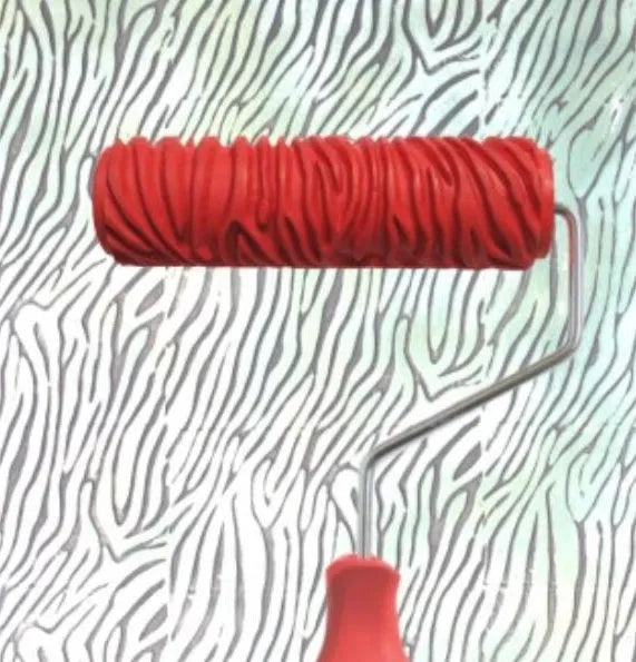 Red 7 inch paint embossing roller with patterned rubber head for textured wall effects