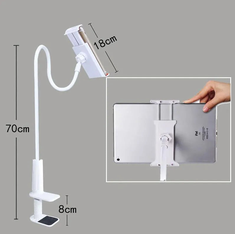 Black bedside phone holder with a long metal arm and adjustable plastic head gripping a mobile phone.