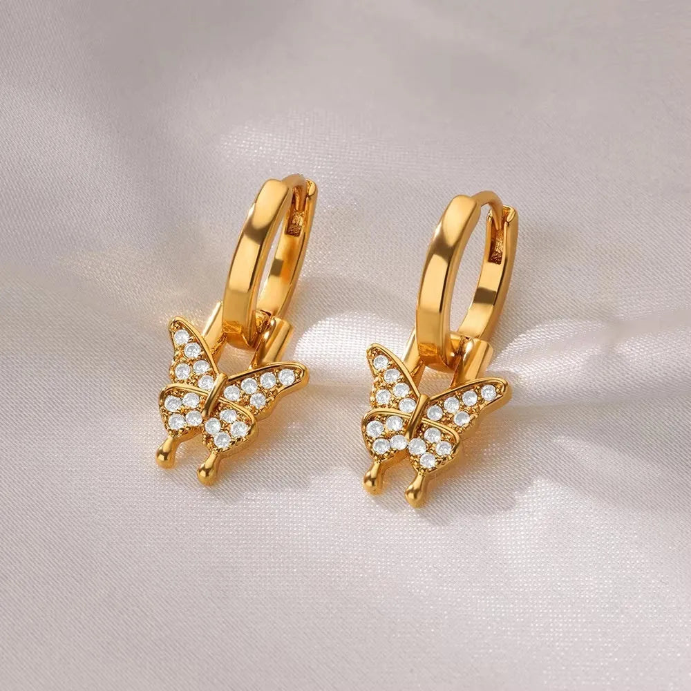 Women's geometric butterfly earrings with heart, star and bow shapes in copper