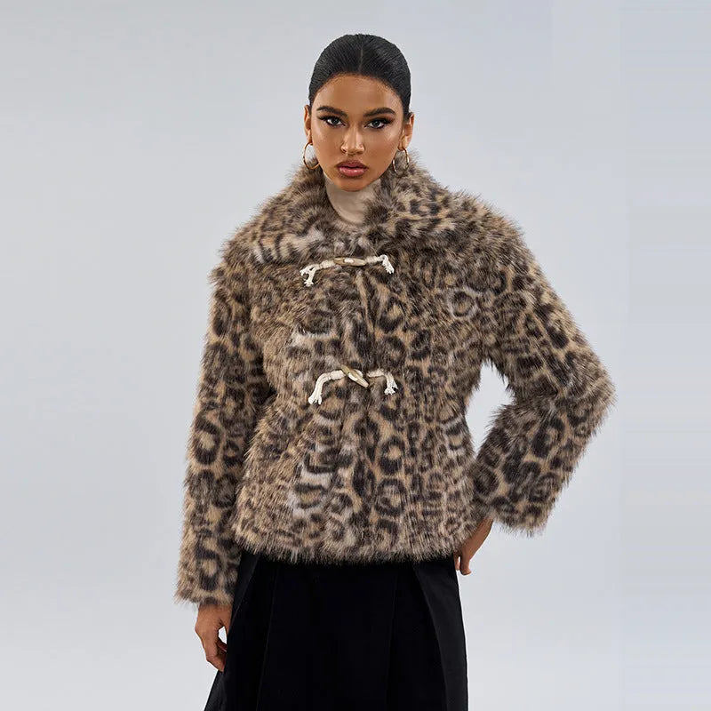 Women's leopard print street fashion coat with regular sleeves on a hanger.