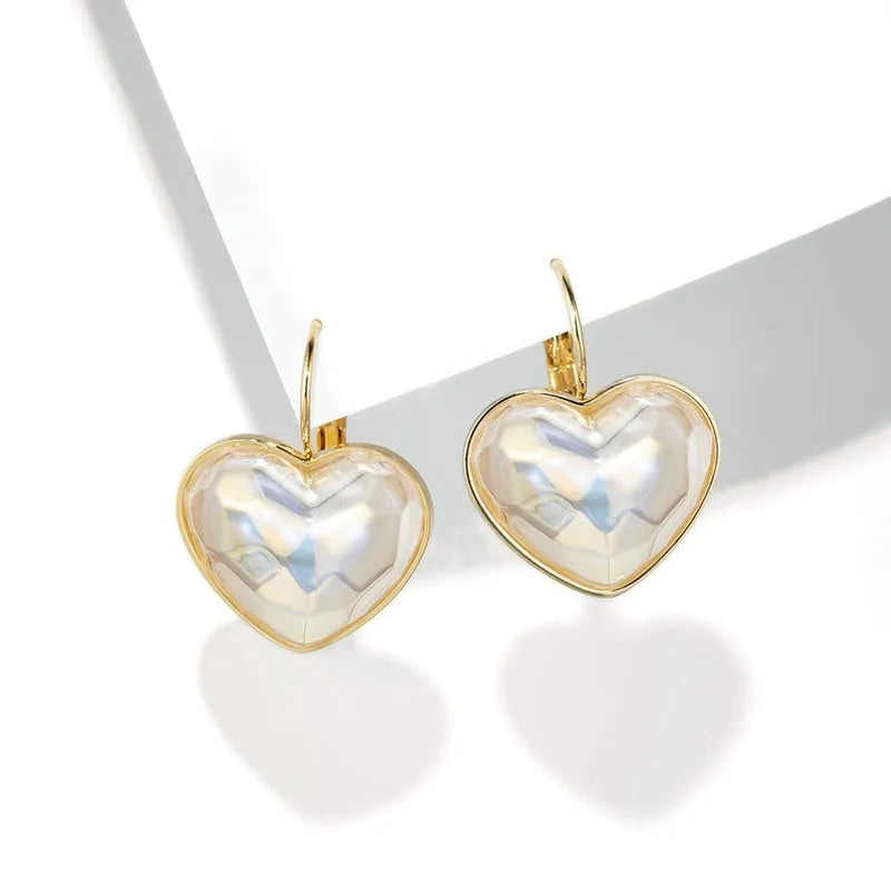 Gold colour alloy ear clips with metal elements and natural style for women