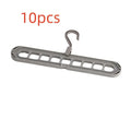 Plastic nine-hole hanger in selected colour for pant storage and folded garment organisation