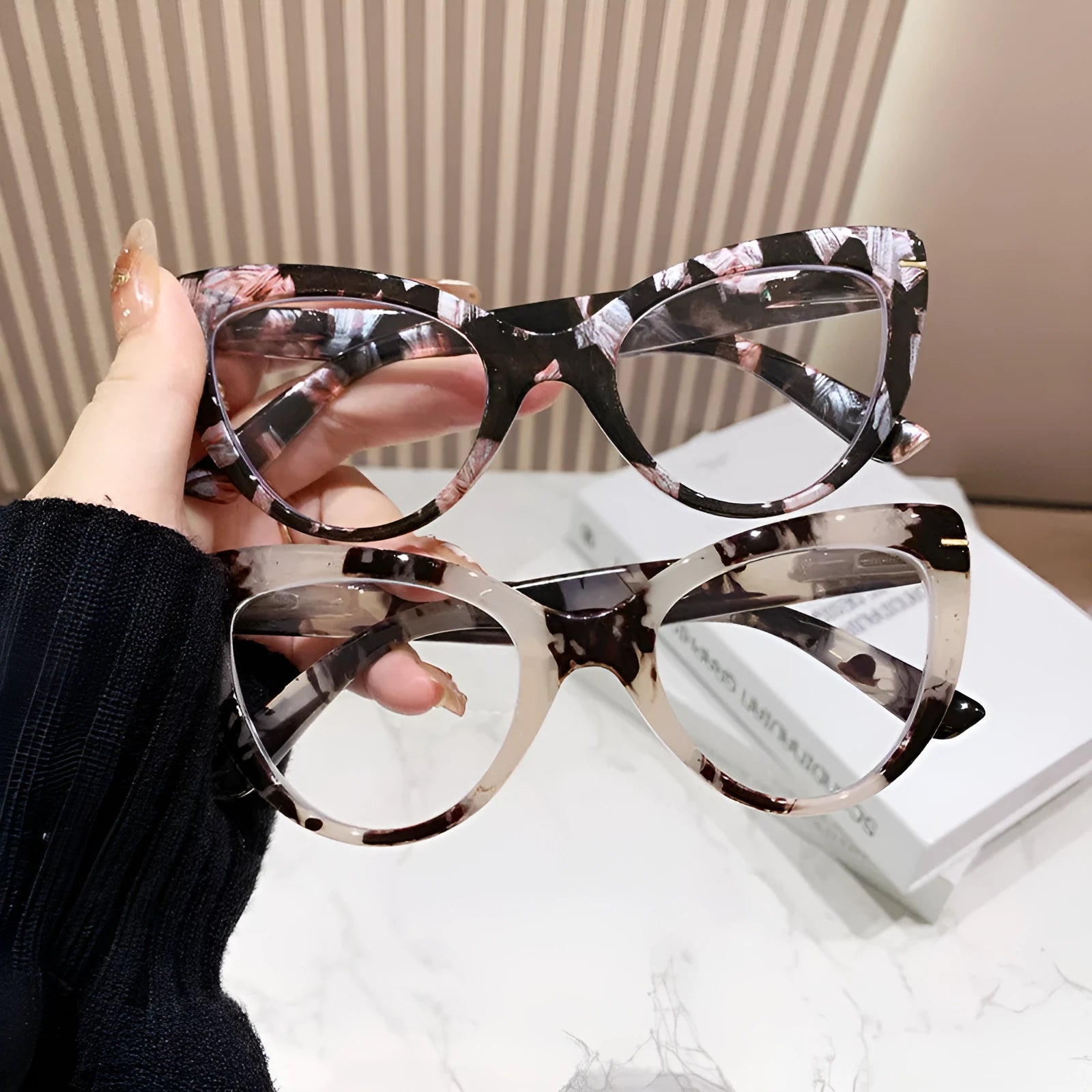 Women's cat eye shaped presbyopic reading glasses with dragon and phoenix decorations on the frame.
