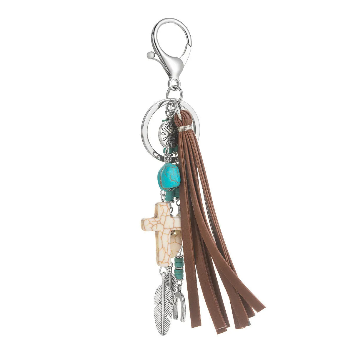 Alloy cross pendant keychain with leather rope and tassel in colour XY-3669 on a wooden surface