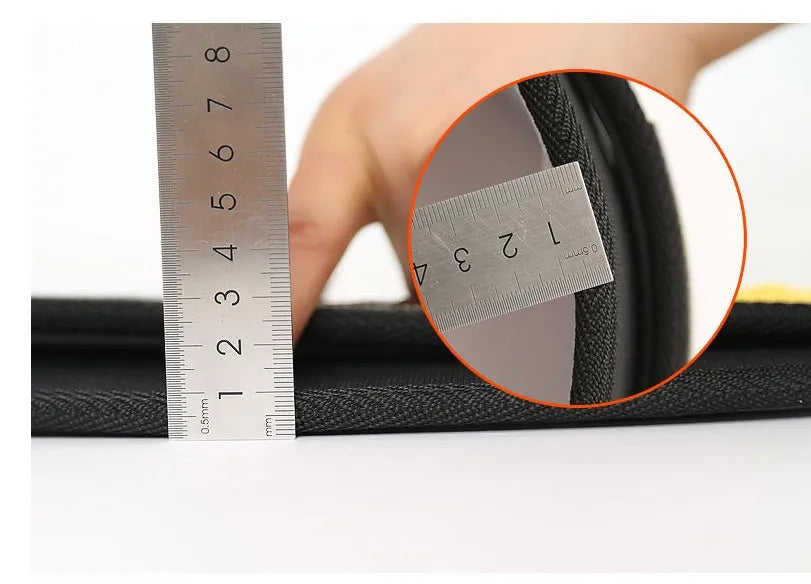 A black adjustable nylon fitness weightlifting waistband or support belt shown on a neutral background.