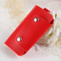 Soft PU leather colour button key case in square vertical section with key bit and cover opening in plain Korean style