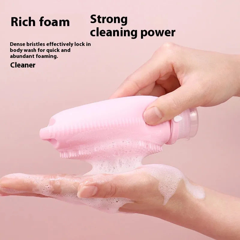 Silicone bath brush storage bottle in eight colour options on a bathroom shelf.