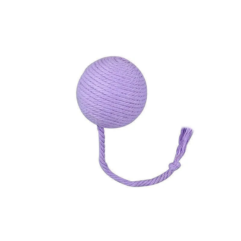 Cat toy ball with attached rope and bell in green, pink, purple or yellow colours showing 6cm and 3cm size comparison