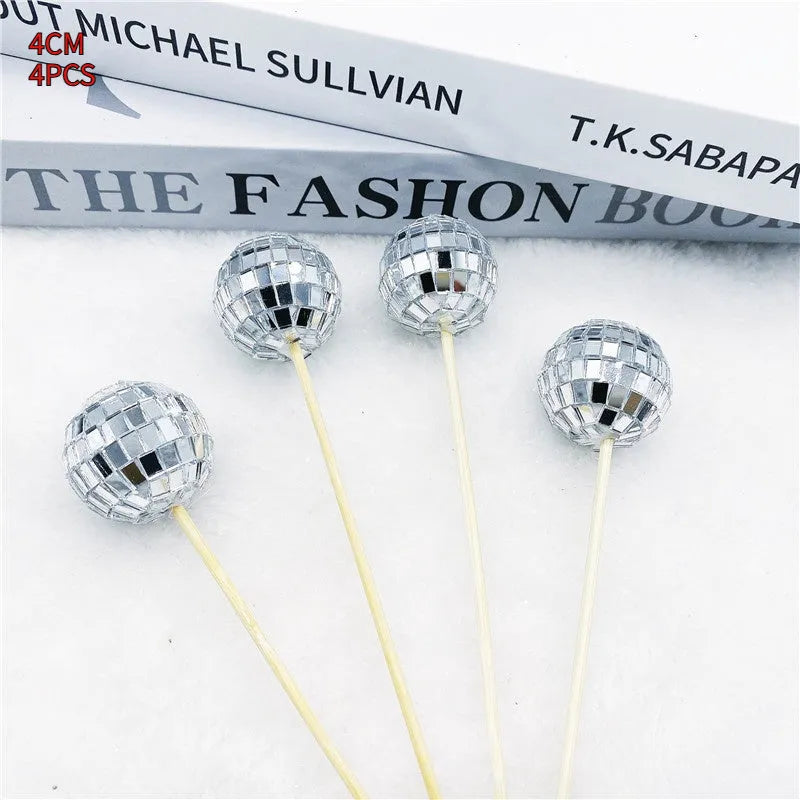 Glass disco ball cake decoration on wooden stick available in four sizes from 2.5cm to 5cm diameter