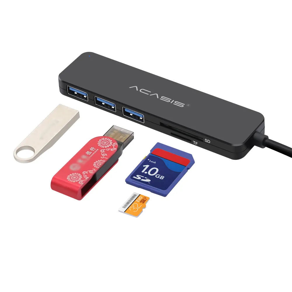 Black USB hub card reader with 5Gbps speed and memory card slot on a desk