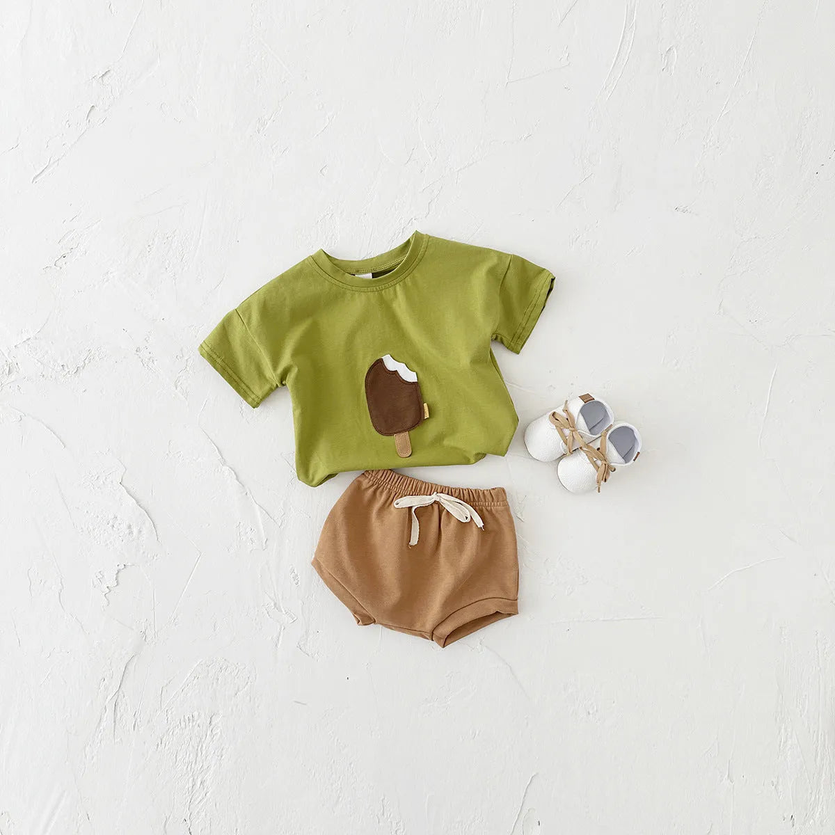 Girls' cotton casual round neck ice cream patch short sleeve shorts suit in Olive, Apricot, and White for summer