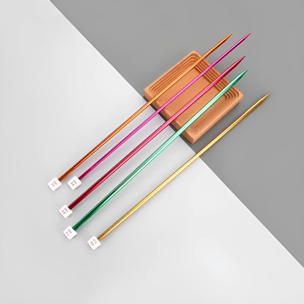 Set of lengthened crochet hooks with end caps displayed in sizes from 2.0mm to 10.0mm.