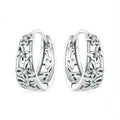 Sterling silver butterfly earrings with zircon stones and retro hollow design measuring 14mm by 5mm