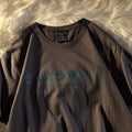 Cotton short sleeve t-shirt in loose fit style available in black, white, and dark grey colours