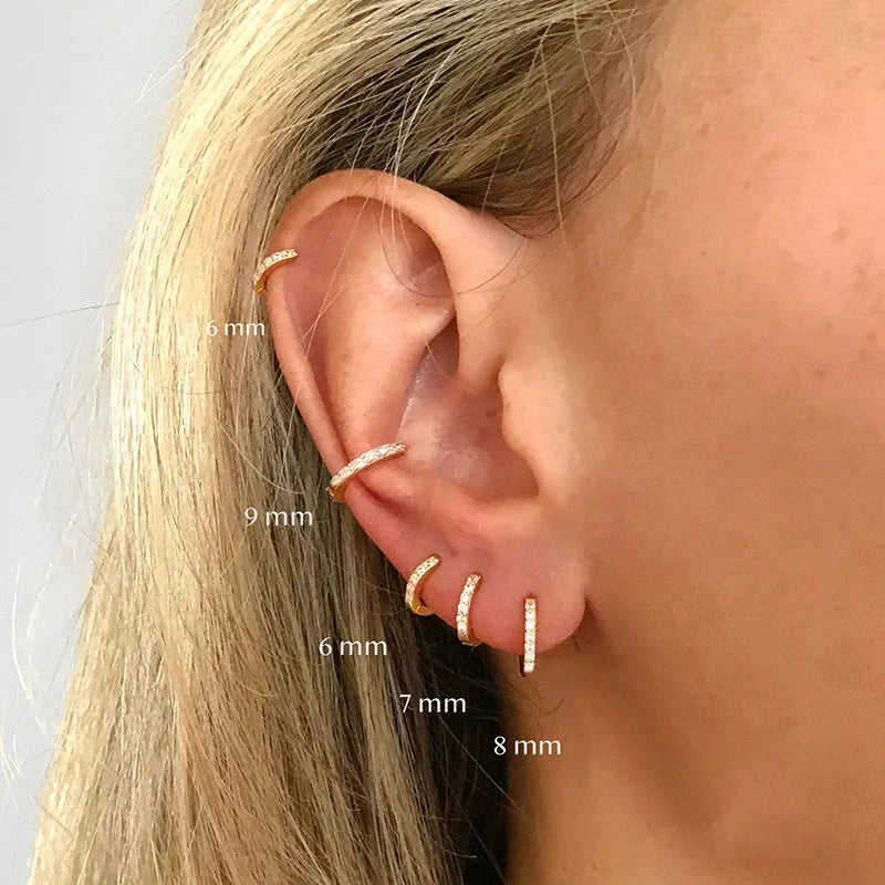 Circle geometric zircon stud earrings in gold, rose gold, or silver colour on a copper base.