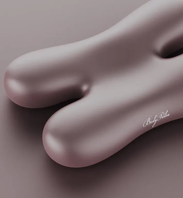 Purple memory foam side sleeping pillow 58x40cm on a bed
