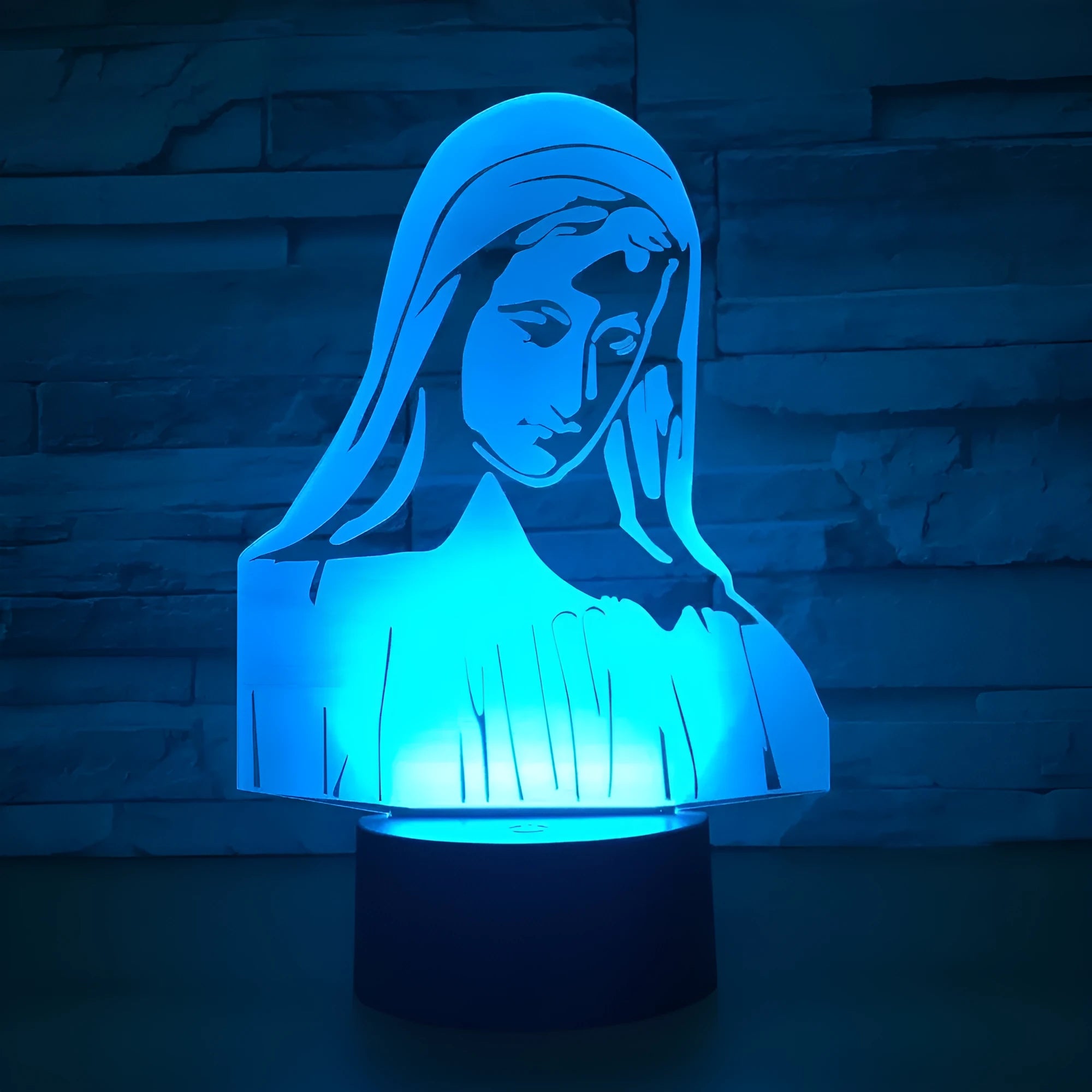 3D stereoscopic dual-ring LED night light with colour changing effects on an ABS base.