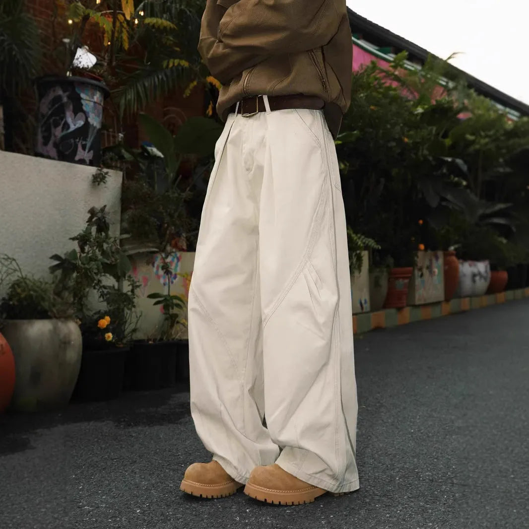 Men's pleated straight-leg trousers in black colour showing front design with micro-elastic fabric