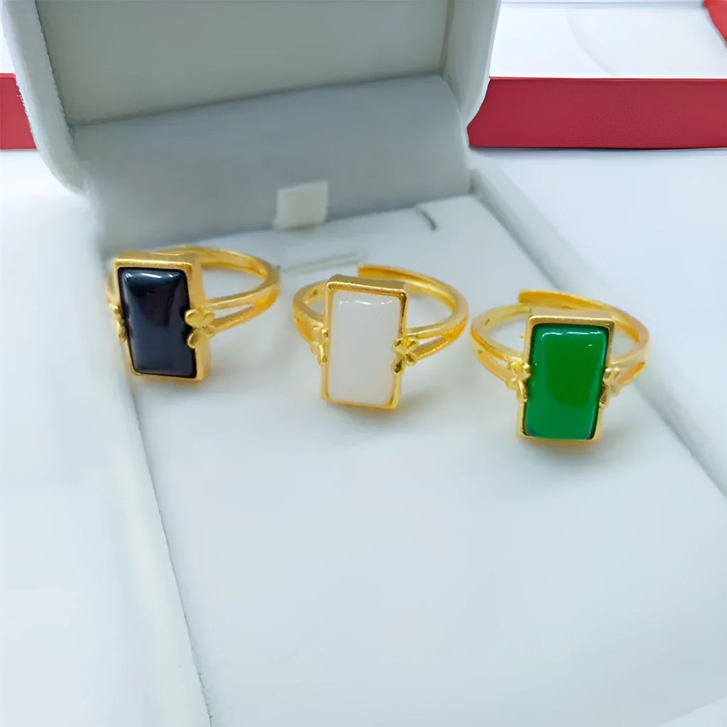 Brass gold-plated adjustable ring with long artificial gemstone in green, white, or black colour option