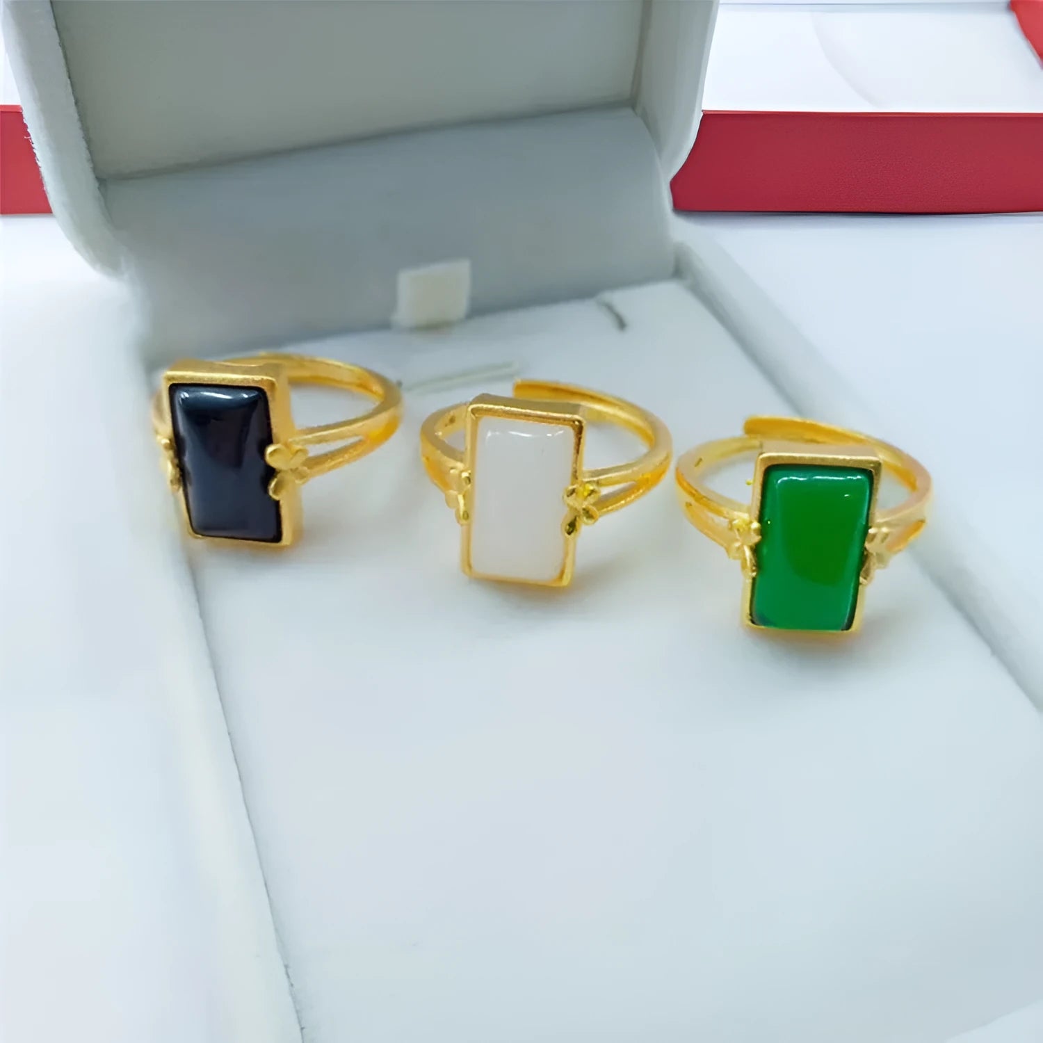Brass gold-plated adjustable ring with long artificial gemstone in green, white, or black colour option