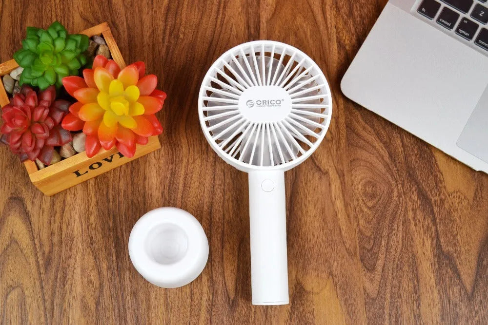 ORICO FH1 white portable USB rechargeable fan with adjustable speed settings and handheld design