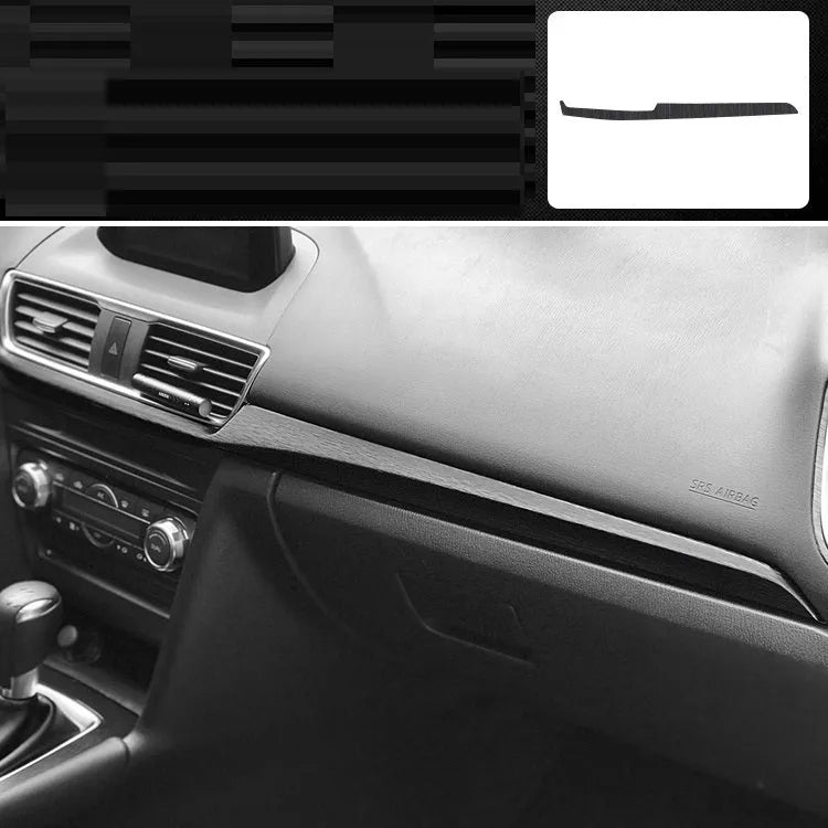 Car interior decorative film sticker kit showing carbon fibre pattern applied to centre console and dashboard