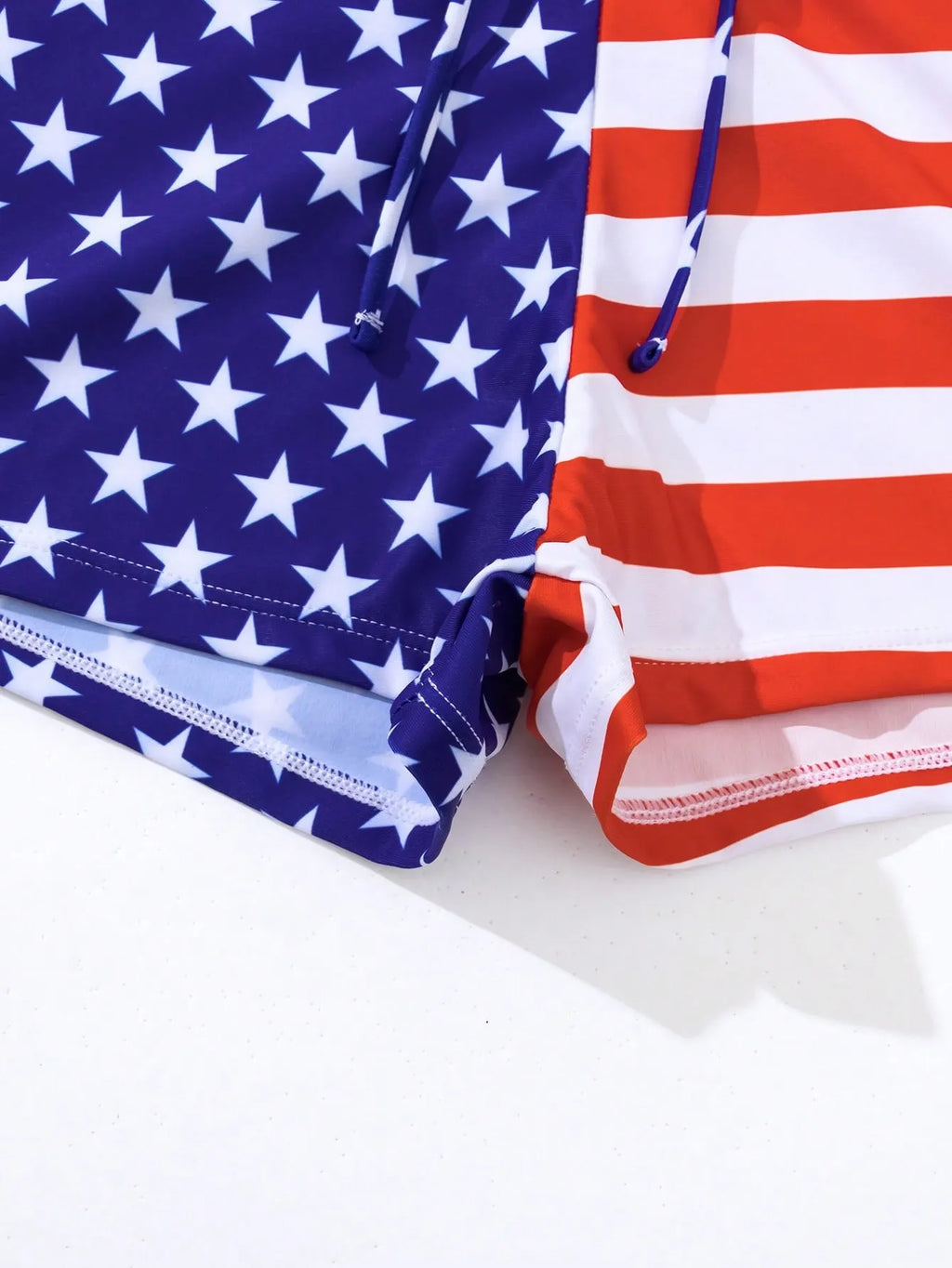 Women's high waist boxer swimsuit with Stars and Stripes pattern and a drawstring waistband.