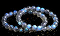 Natural cream body blue moonlight crystal bracelet with grinding finish on wrist