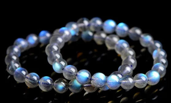 Natural cream body blue moonlight crystal bracelet with grinding finish on wrist
