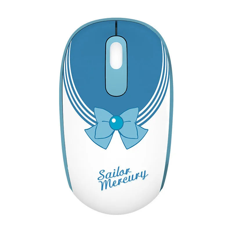 Pink Sailor Moon wireless mouse with USB receiver on desk