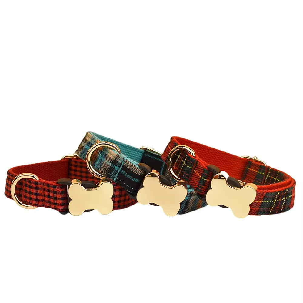 Flat fabric dog collar with printed grid pattern and bone-shaped buckle clasp