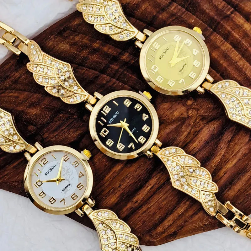 Women's stainless steel watch with round dial showing gold face colour option