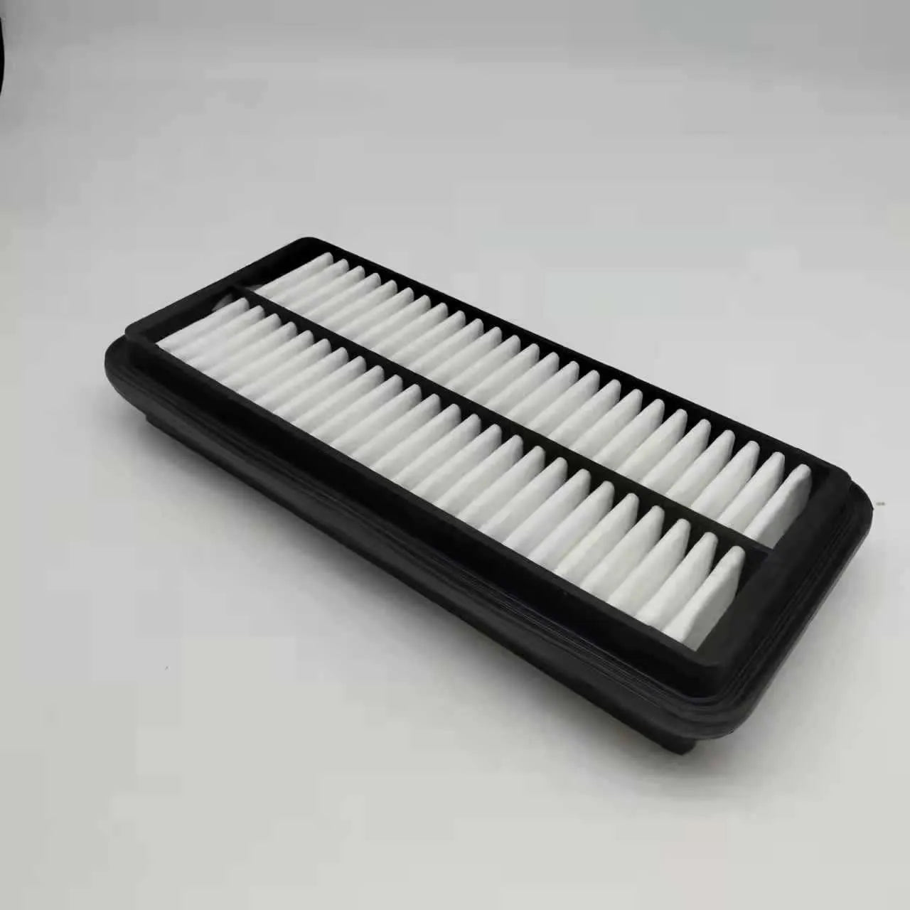 Black car air filter with 256mm x 113mm x 40mm dimensions for modern vehicle replacement