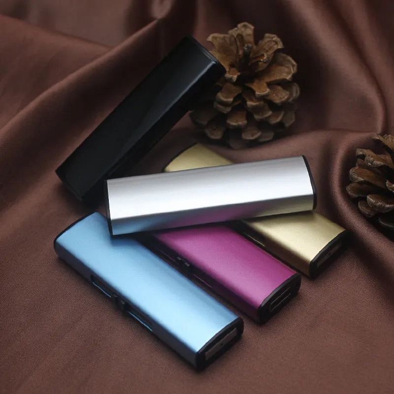 Rechargeable metal windproof cigarette lighter in hand, plain design, random colour