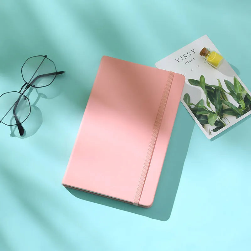 A5 tactile PU hardcover notebook in black with adhesive binding and 100gsm white paper