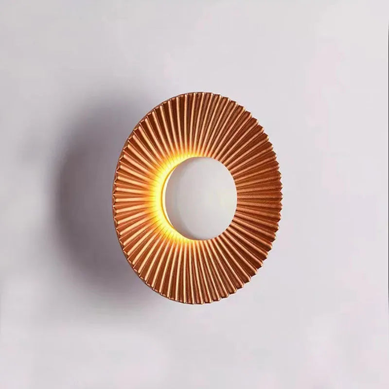 Round aluminium wall lamp with LED lighting in white and gold colour combination for bedroom or living room