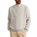 Grey half-zip loose knit sweater for men with long sleeves on a hanger.