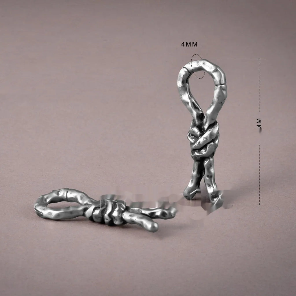 Creative Bends And Hitches 4mm copper auricle earrings with a bent, retro design.