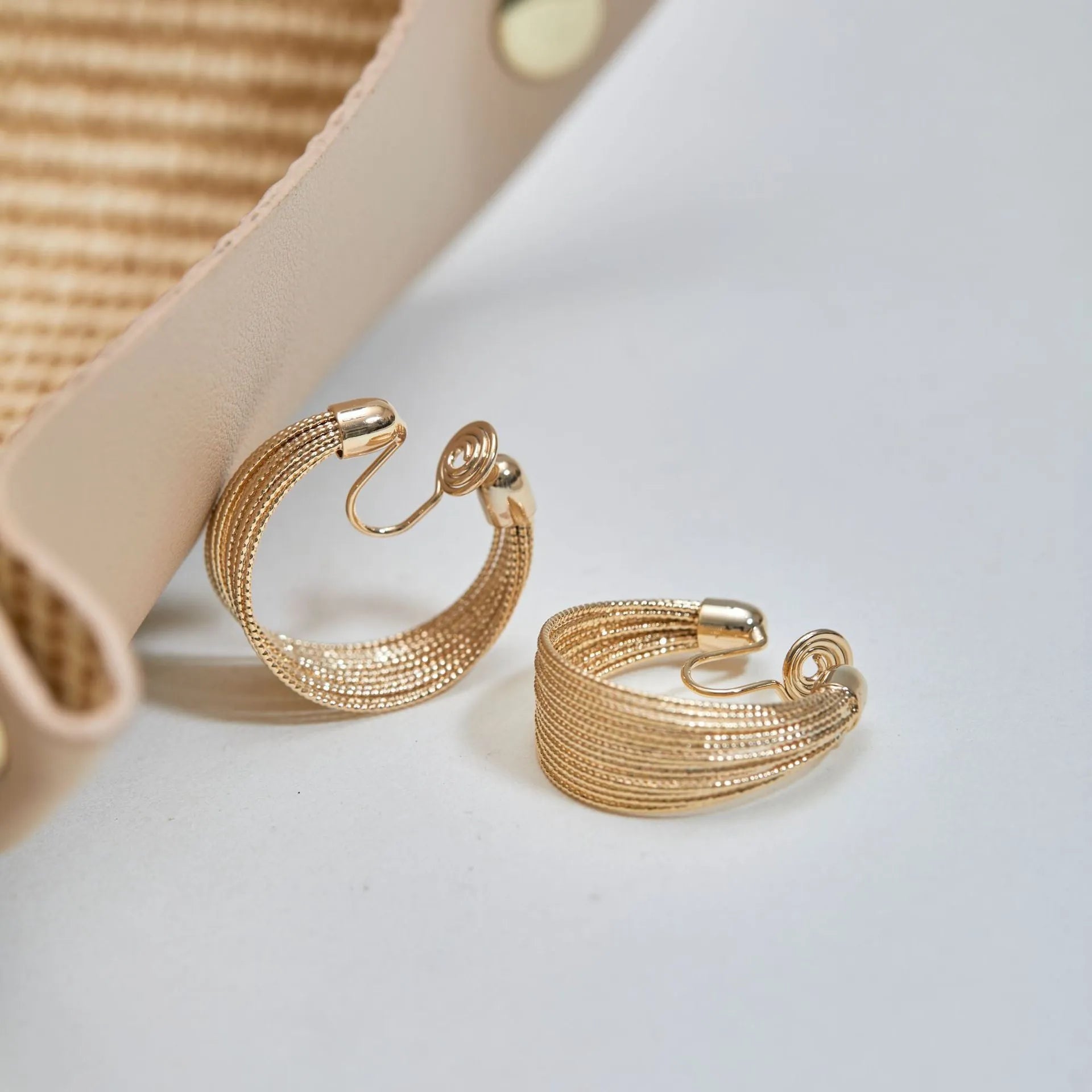 Geometric multi-layer copper earrings in silver or gold finish as stud or clip styles