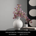 White American country style ball striped ceramic vase with orchid arrangement